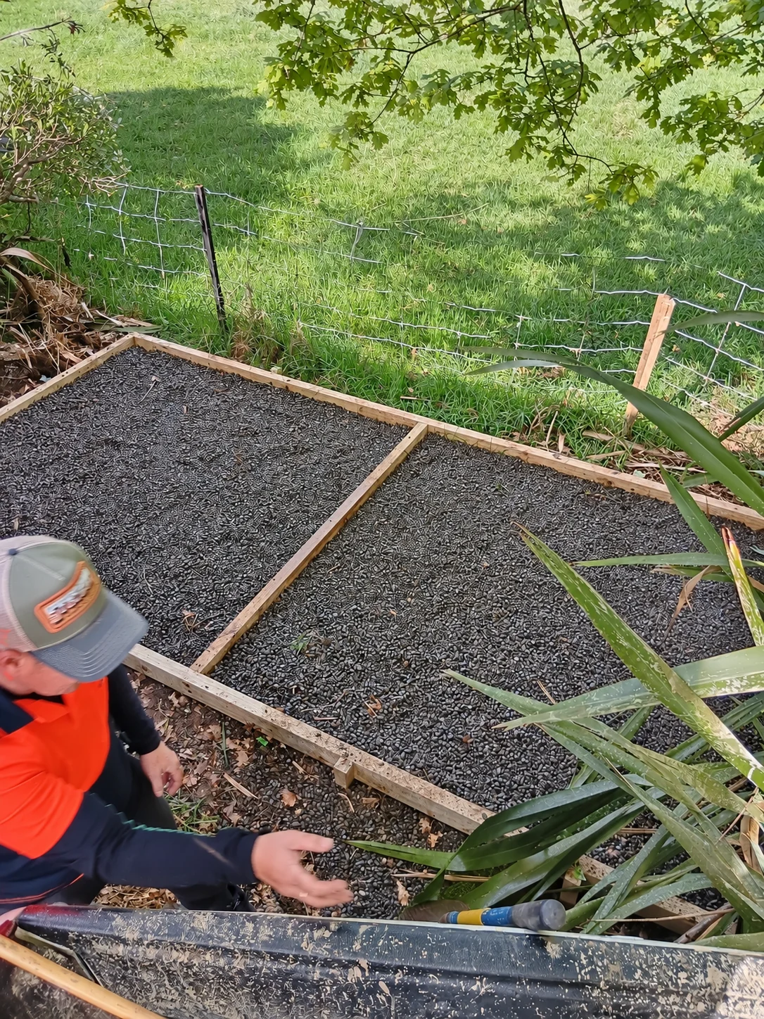 Timber-edged gravel base during installation